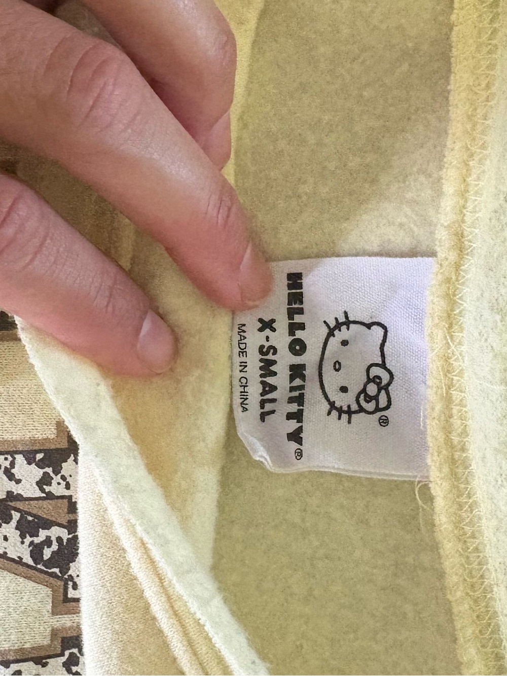 Hello Kitty Cream Off-Shoulder Sweatshirt with Patterned Lettering - Picture 8 of 8